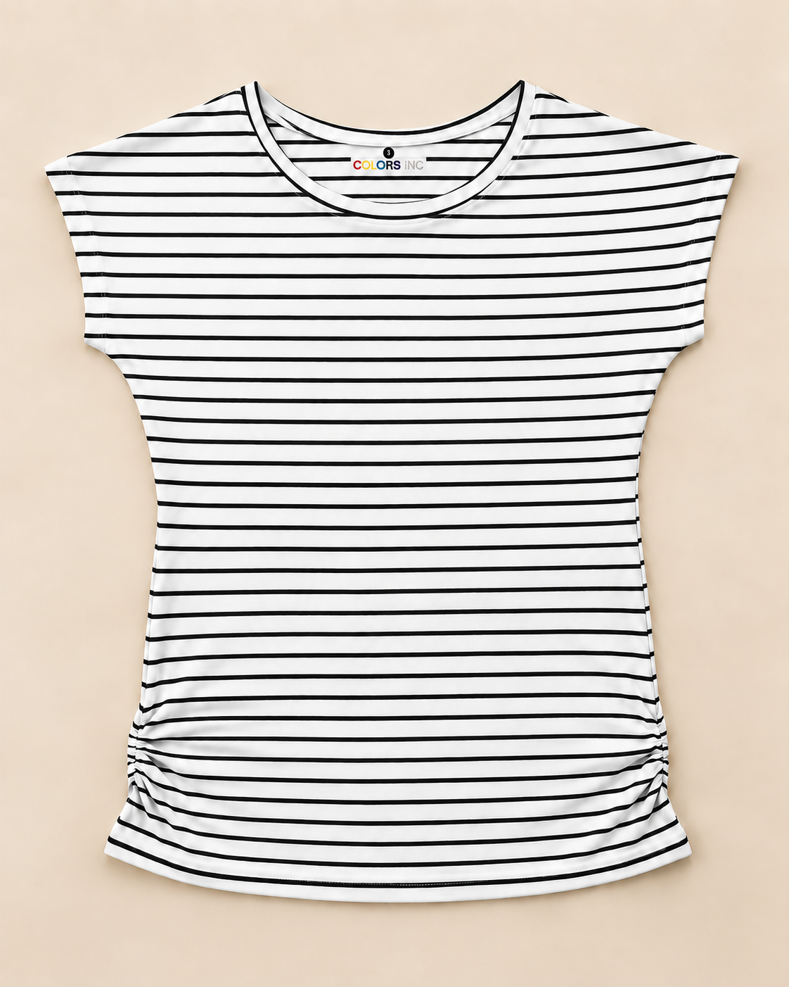 A Black and white striped Women's T-shirt combines comfort with a side-gather placed on the light beige 