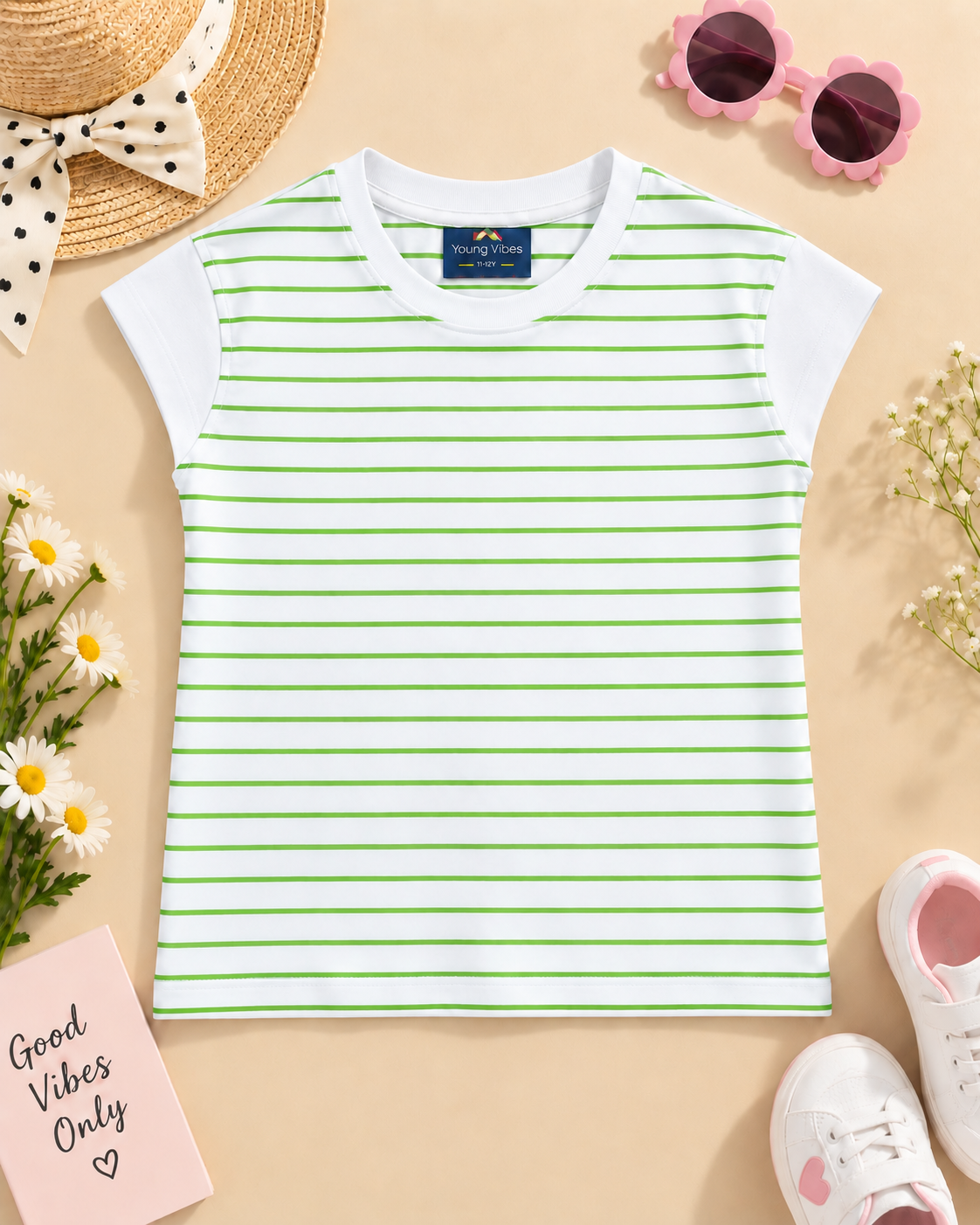 A trendy green and white striped kids’ T-shirt with white cap sleeves T-shirt placed on the light beige background