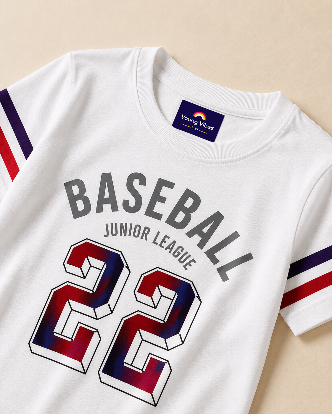 Closeup view of Baseball print design in kids white T-shirt placed in Light beige background
