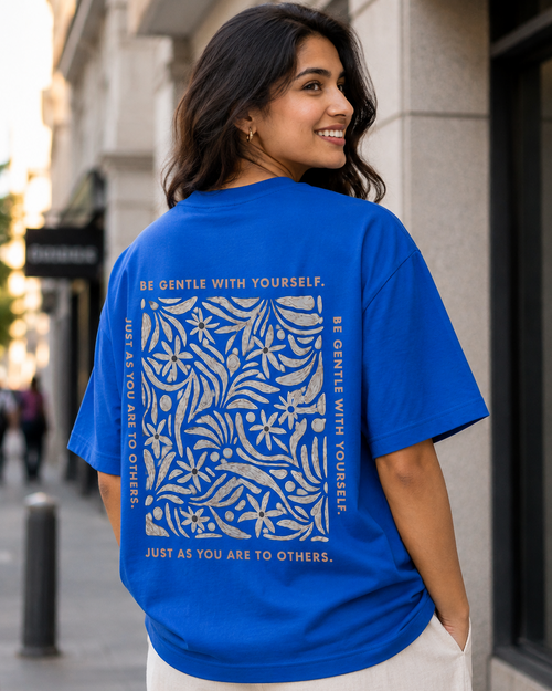 Back view of blue colour oversized T-shirt with Be gentle With yourself T-shirt print