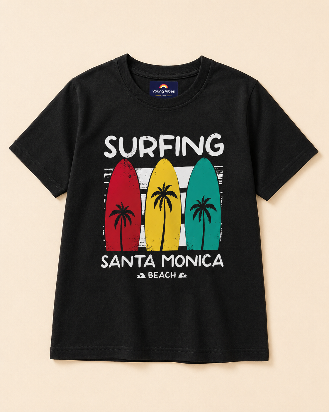 Black T-shirt with surfing beach  print placed in light beige background