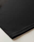 Black fabric on a white background