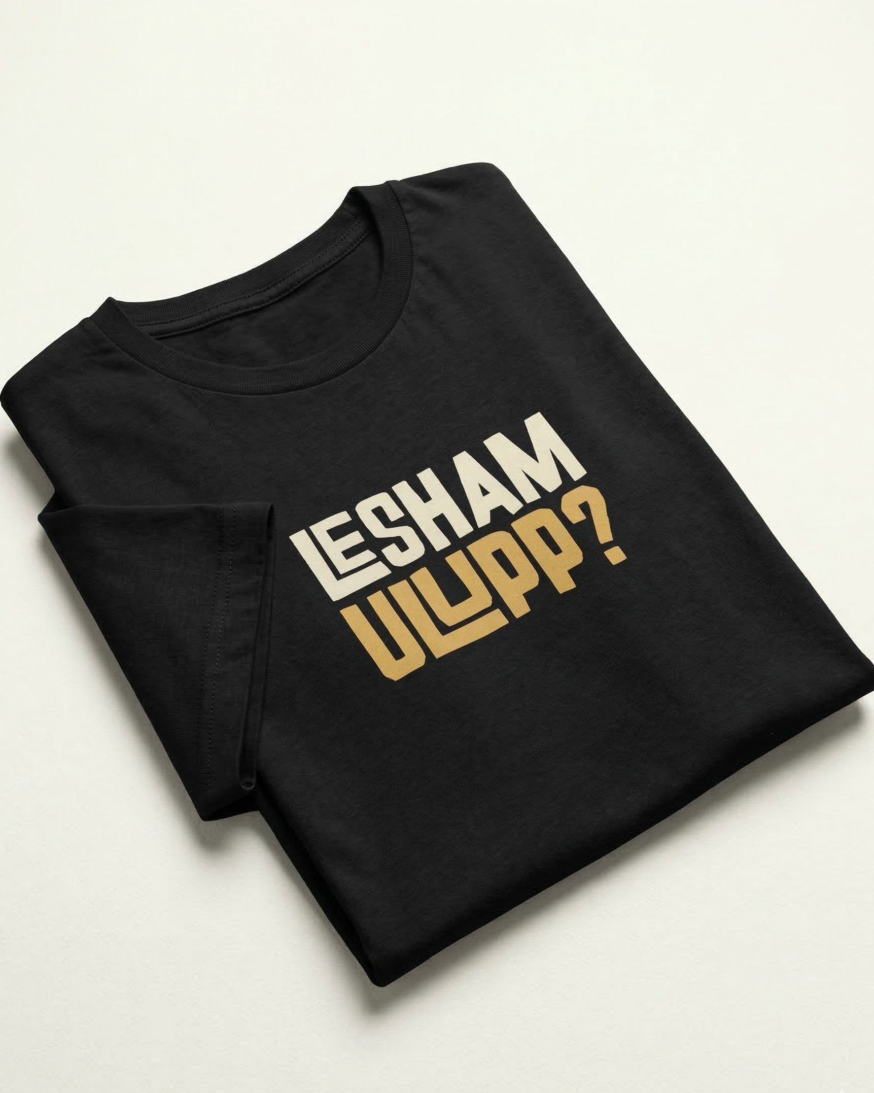 Black t-shirt with 'Lesham Ullip?' text on a white background