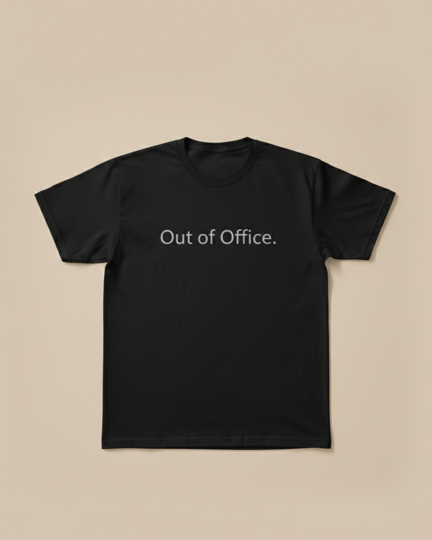 Black t-shirt with 'Out of Office' text on a beige background