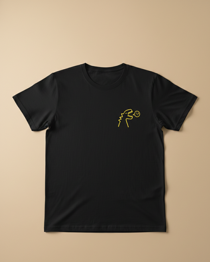 Black t-shirt with a gold graphic on a beige background