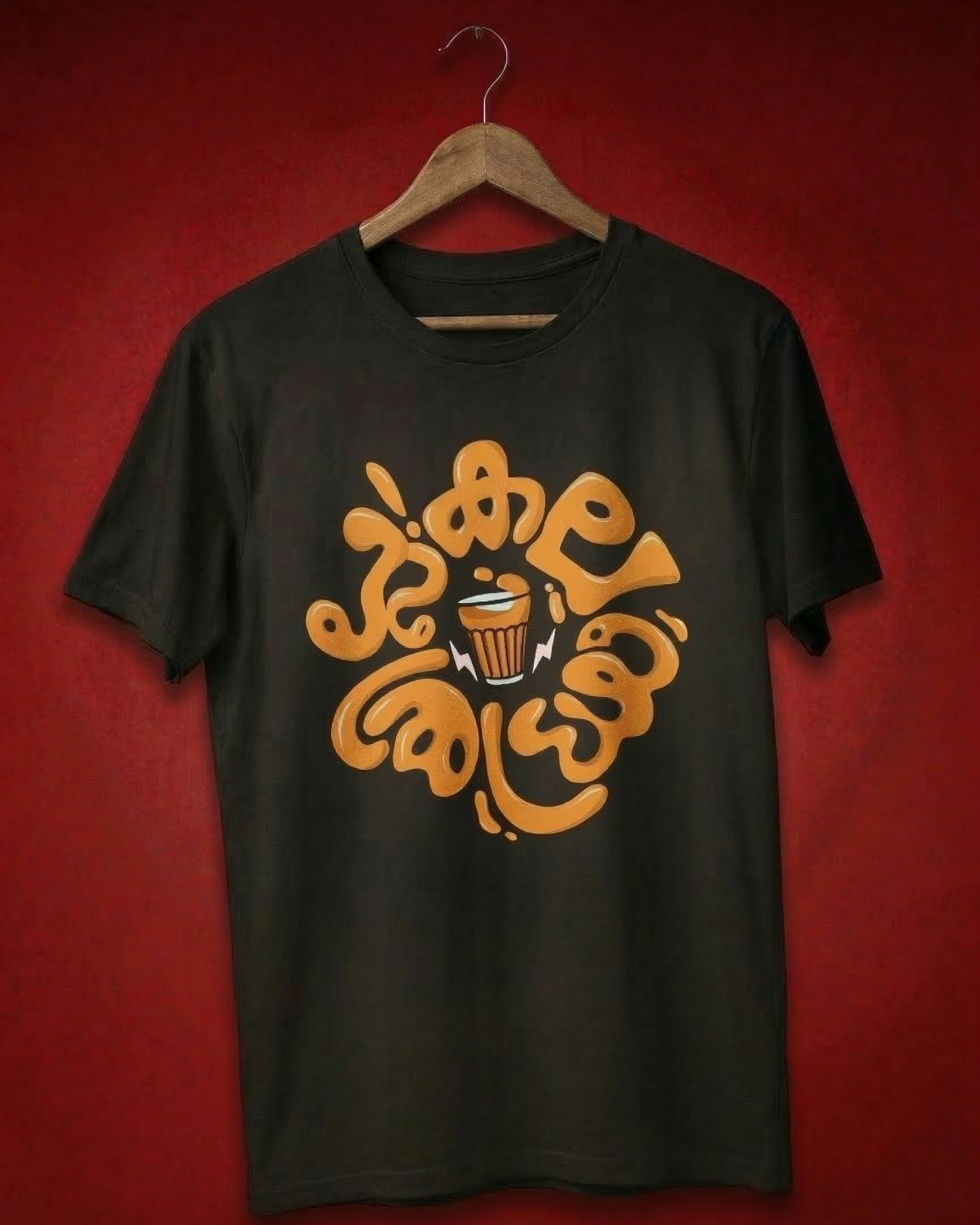 Black t-shirt with orange graphic design on a red background