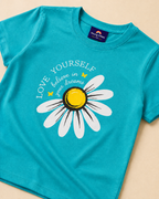 Blue  Green T-shirt with Sunflower print placed on the light beige background