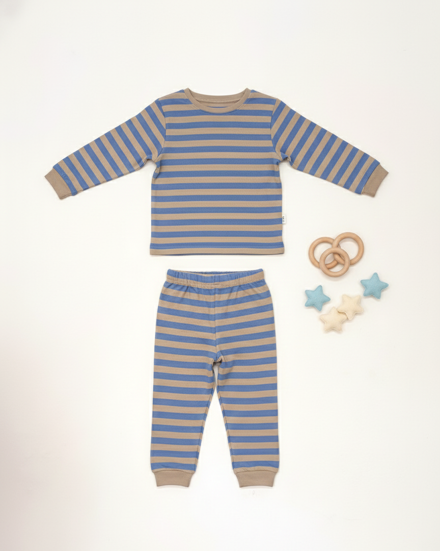 Blue and beige striped pajama set with toys on a white background