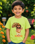 Boy wearing a cute Maveli light green kids T-shirt in gardern