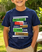 boy wearing Navy T-shirt with Believe yourself print closeup view 