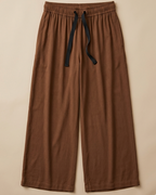 Brown Palazzo Pant placed on beige colour background