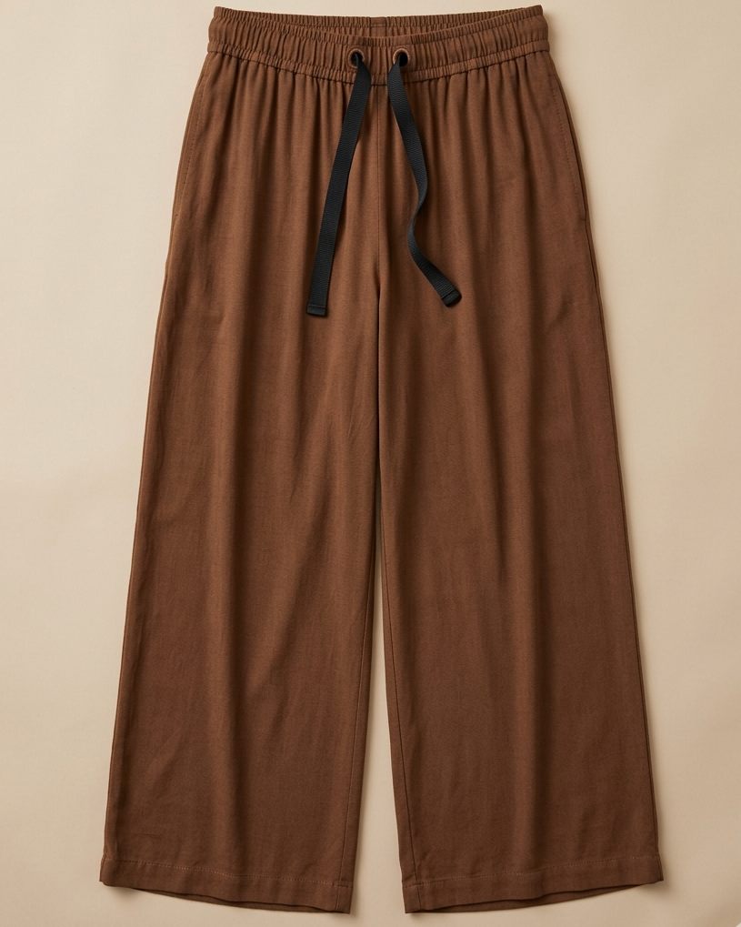 Brown Palazzo Pant placed on beige colour background