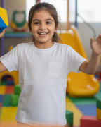 Child in a playground with colorful equipment