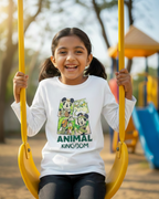 Child on a swing wearing a 'Disney Animal Kingdom' shirt with playground equipment in the background.