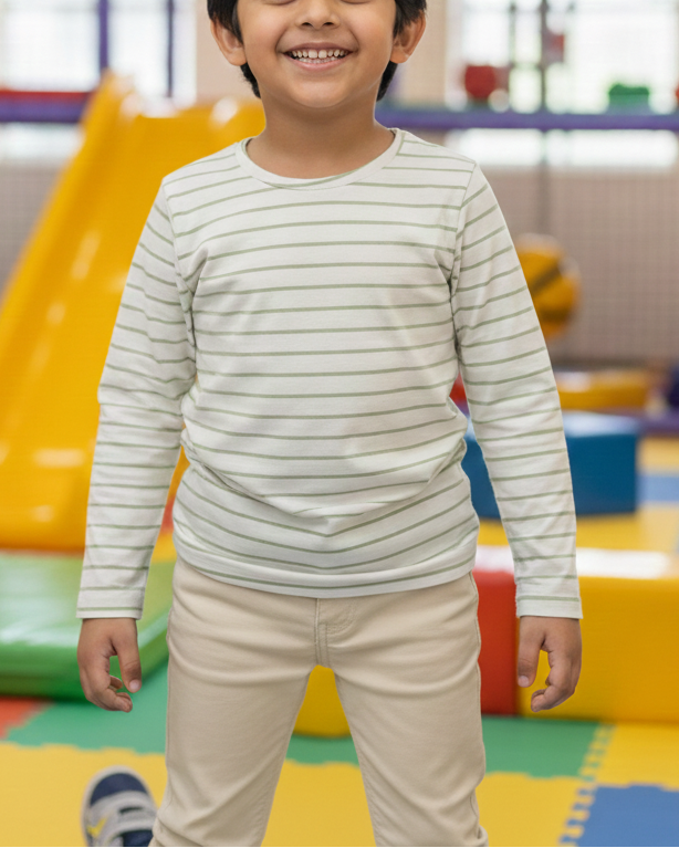 Child standing in a colorful indoor play area
