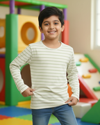 Child standing in a colorful play area