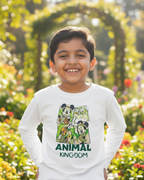 Child wearing a 'Disney Animal Kingdom' shirt in a garden background