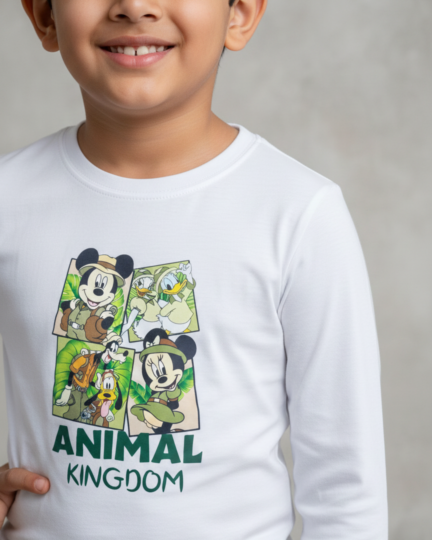 Child wearing a 'Disney Animal Kingdom' shirt in a white and grey background.