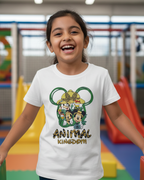 Child wearing a 'Disney Animal Kingdom' t-shirt in an indoor playground setting