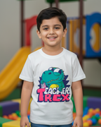 Child wearing a 'Teacher T-Rex' t-shirt in an indoor playground setting