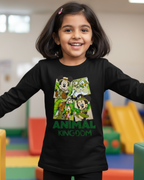 Child wearing a black long-sleeve shirt with 'Animal Kingdom' graphic in a colorful indoor setting