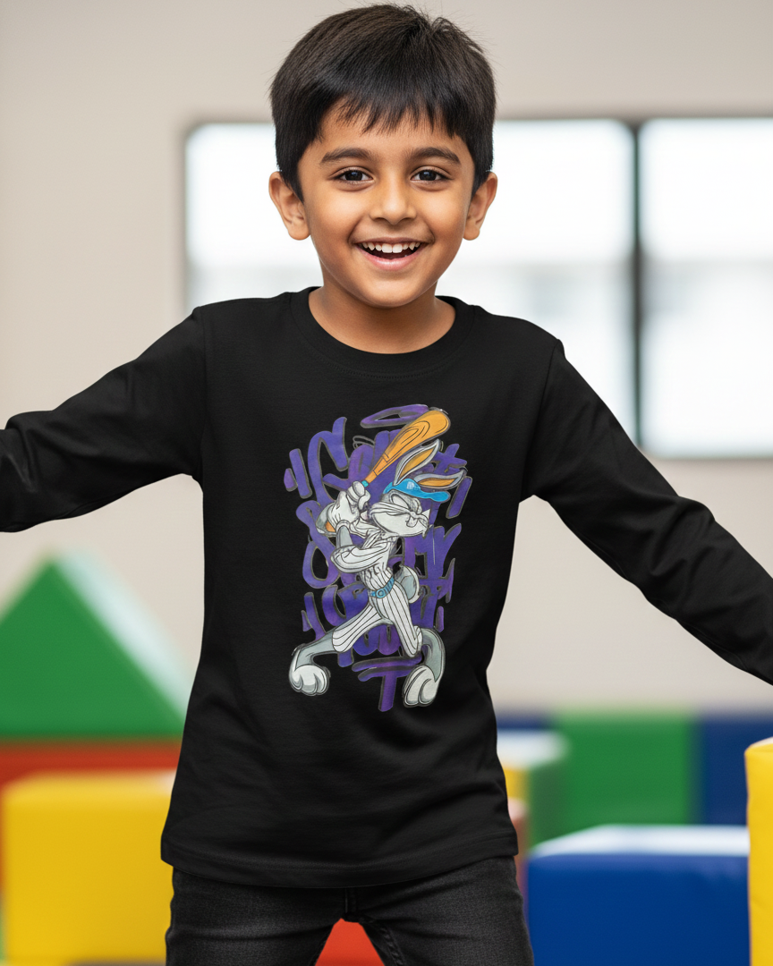 Child wearing a black long-sleeve shirt with a cartoon character design in a classroom setting