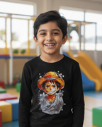Child wearing a black long-sleeve shirt with a colorful graphic design in a playroom.