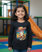 Child wearing a black long-sleeve shirt with a colorful graphic design in an indoor playground.