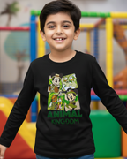 Child wearing a black long-sleeve shirt with cartoon character design in an indoor playground.