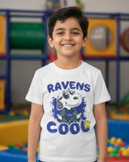 Child wearing a t-shirt with 'Ravens Cool' design in a colorful indoor playground.