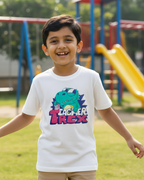 Child wearing a t-shirt with a dinosaur graphic on a playground
