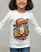 Child wearing a white long-sleeve shirt with a colorful graphic design on a plain background