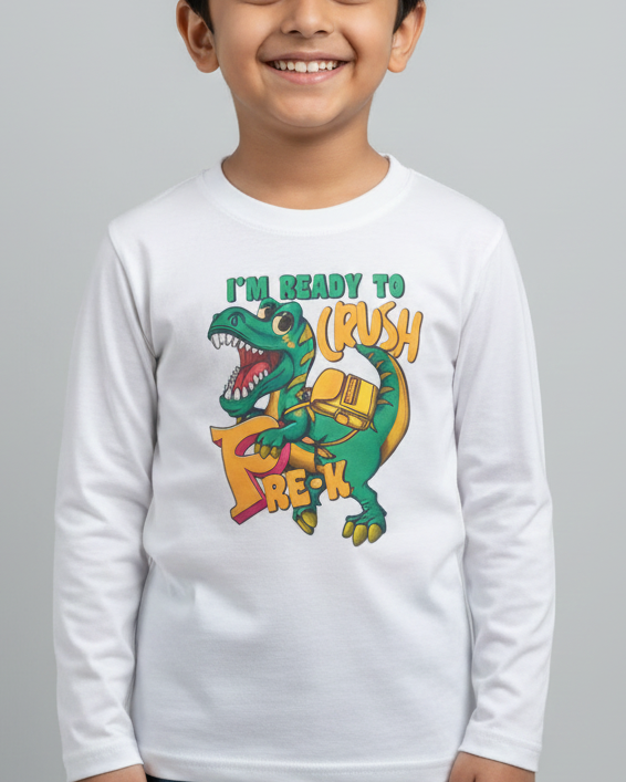 Child wearing a white long-sleeve shirt with a dinosaur graphic and text on a gray background