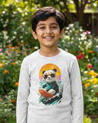 Child wearing a white long-sleeve shirt with a panda design in a garden background.