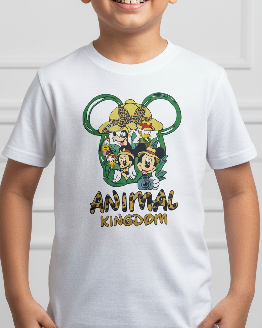 Child wearing a white t-shirt with 'Animal Kingdom' graphic design.