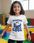 Child wearing a white t-shirt with 'RAVENS COOL' design in a colorful indoor setting