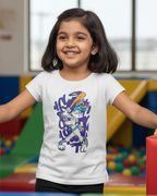 Child wearing a white t-shirt with a colorful graphic design in an indoor playground setting