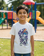 Child wearing a white t-shirt with a colorful graphic design on a playground background