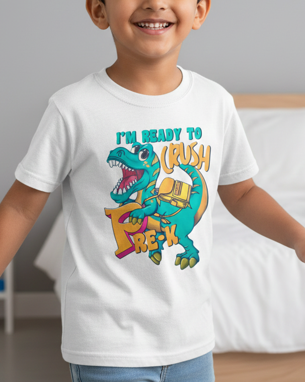 Child wearing a white t-shirt with a dinosaur graphic and text, standing in a room.