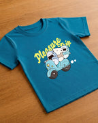 Cute Shark in scooter print in Kids Teal Blue T-shirt placed on wooden background