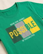 Dark Green T-shirt with Possible print placed on the light beige background 