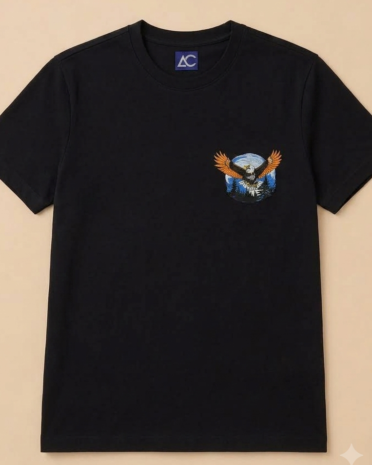 Eagle embroidered Black Regular Fit T-shirt placed on the Light Beige Background