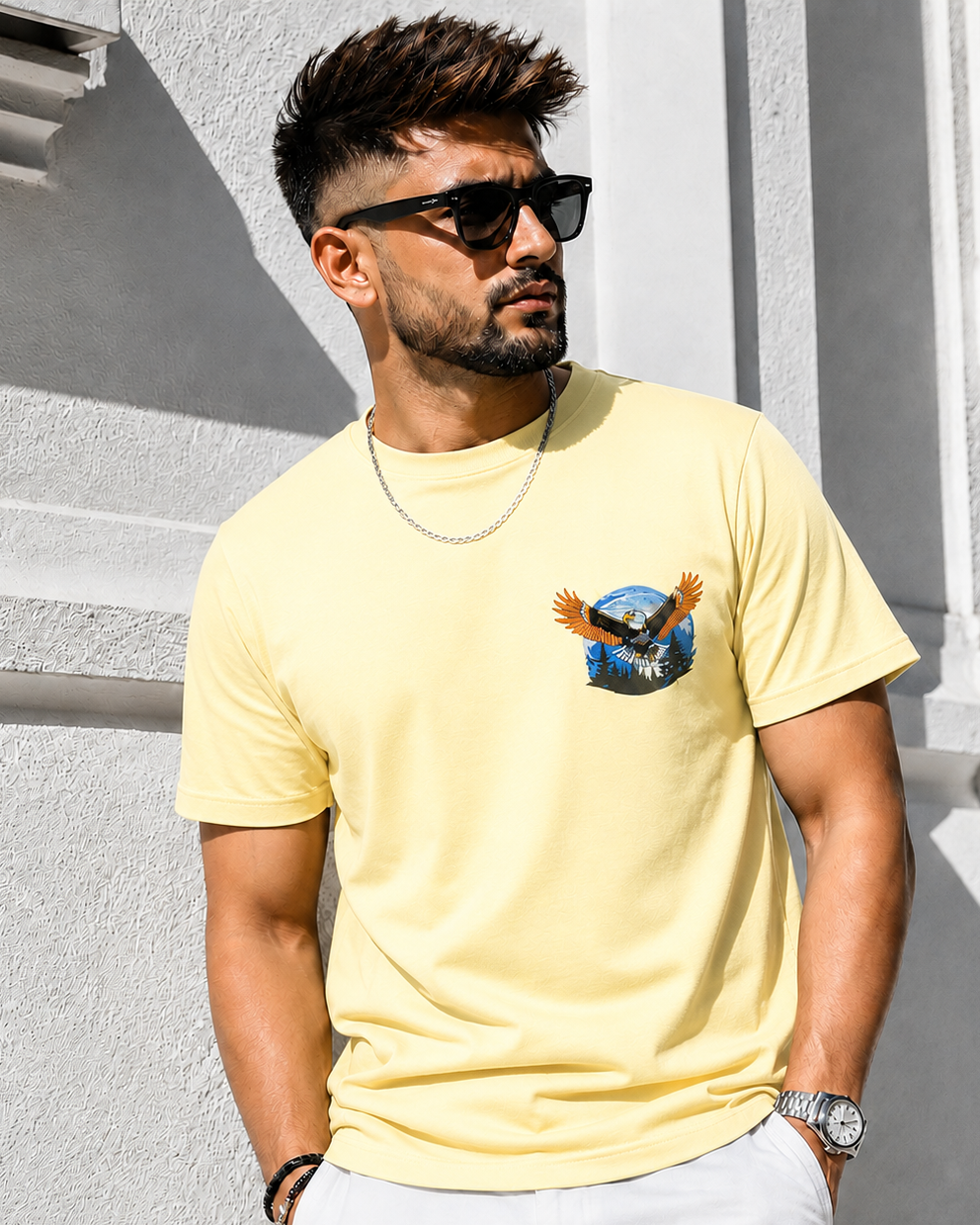 Young man wearing Eagle embroidered Cream Regular Fit T-shirt