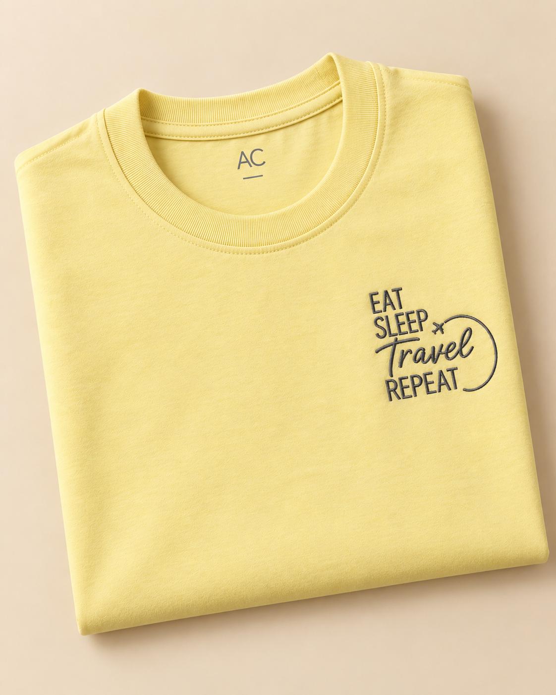 “Eat, Sleep, Travel, Repeat” embroidered Cream Regular Fit T-shirt 