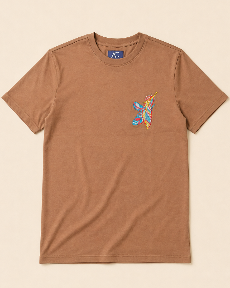 Feather embroidered Brown Regular Fit T-shirt placed on the Light Beige Background