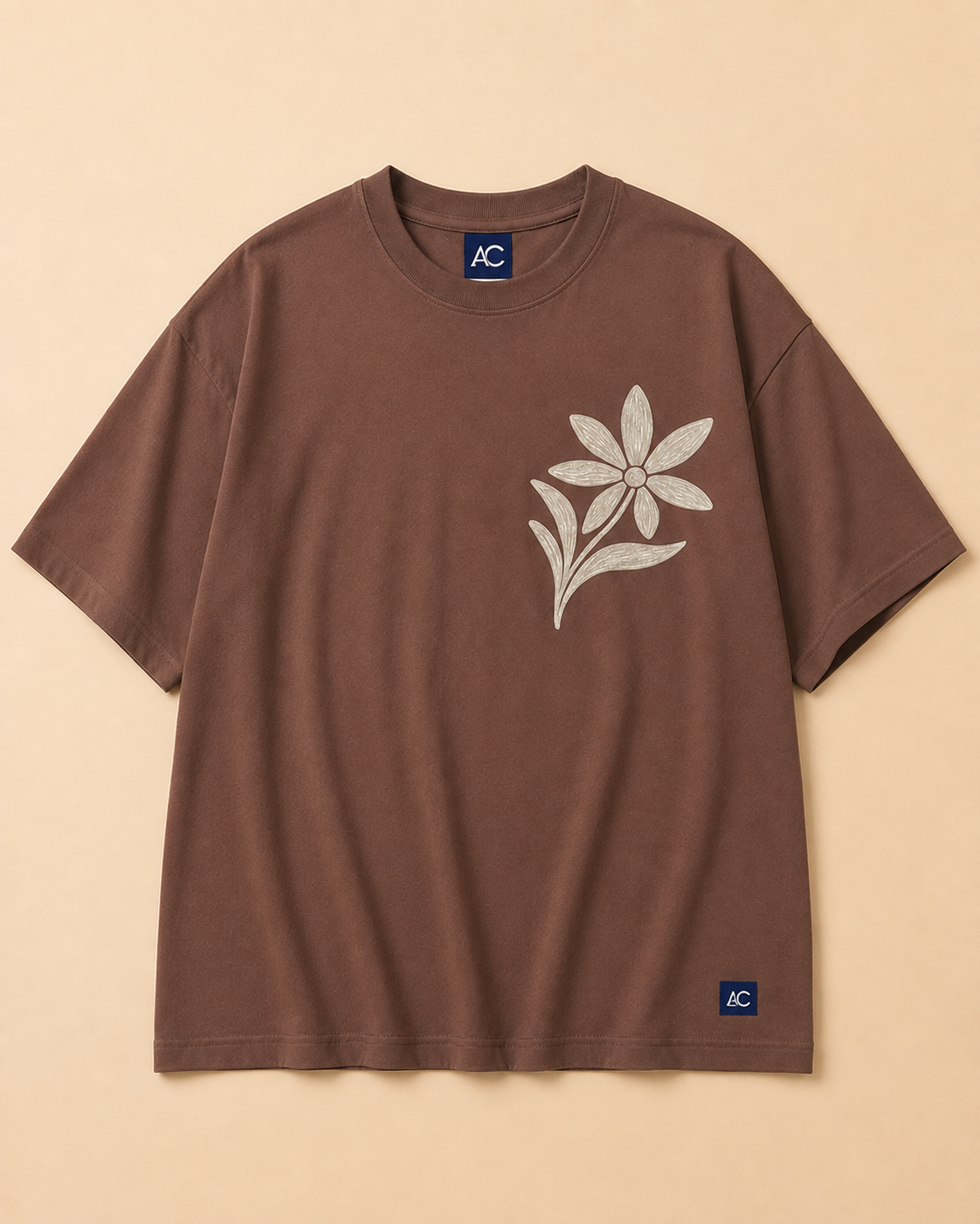Floral Brown Oversized T shirt placed on light beige background