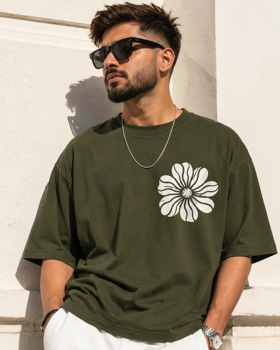 Young man wearing a White Floral Olive Green Oversized T-shirt
