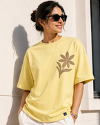 Women wearing a Floral Print in yellow oversized T-shirt

