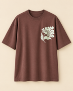 Floral  print in oversized Black Oversized T-shirt placed on the light beige background