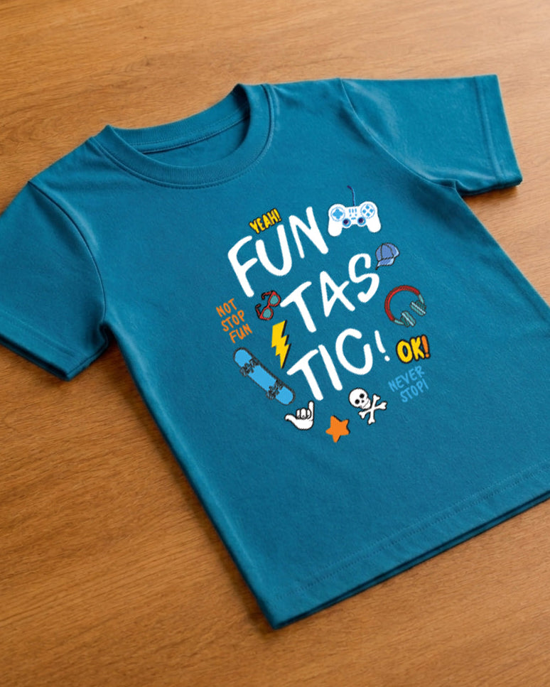 Girl wearing a Funtasctic print in Kids Teal Blue T-shirt placed on wooden background